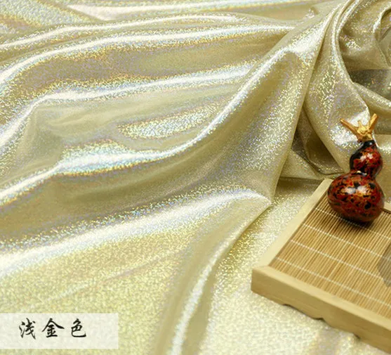 

gold Fabric Laser Stretch Knit Colorful Shiny Fabric Stage Wedding Decor Tissue patchwork paillettes fabric for dolls 150cm*50cm