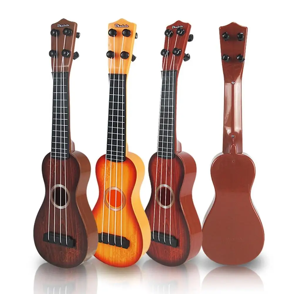 

LeadingStar 4 Strings Kid's Plastic Musical Mini Ukulele Small Educational Hand Guitar Toys For Child zk15