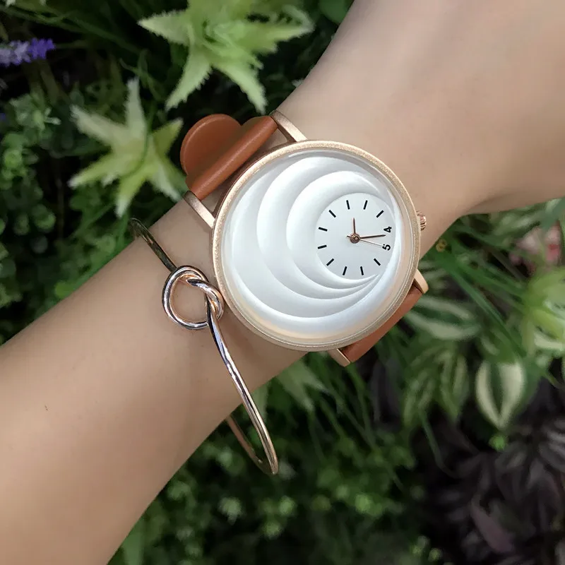 Unique design of three-dimensional vortex dial quartz watch Unique design of three-dimensional vortex dial quartz watch