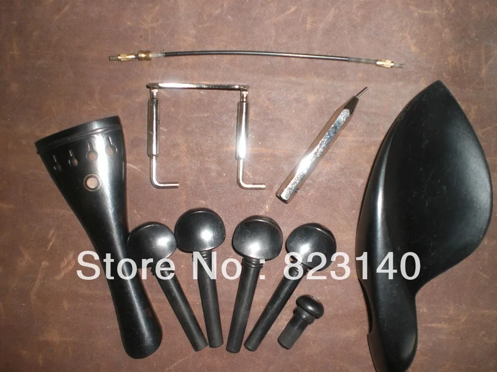 

1 Set EBONY Violin Fitting 4/4 with tail gut and 1 PC SILVER Chin Rest Screw and 1 PC Chin Rest Key SILVER Color