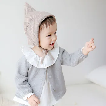 

New winter children's hat pure color warm wool knitted cap newborn ear protective tie cap