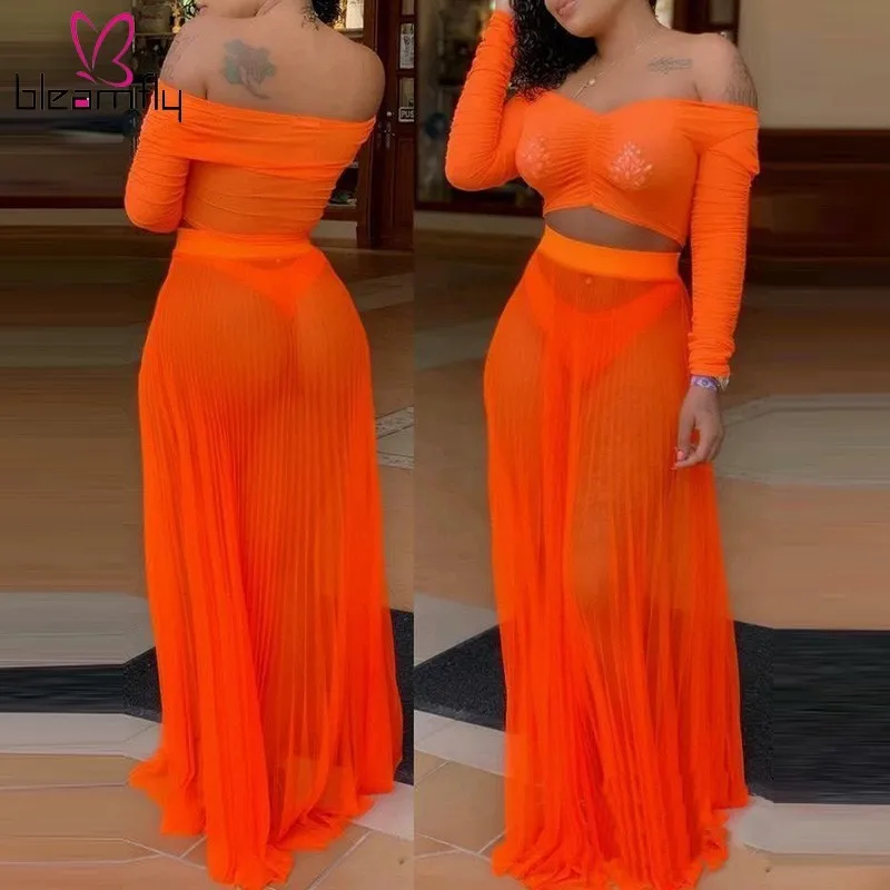 

Neon Orange Sexy 2 Piece Outfits For Women Slash Neck Long Sleeve Crop Top Beach Long Skirts See Through Two Piece Matching Set