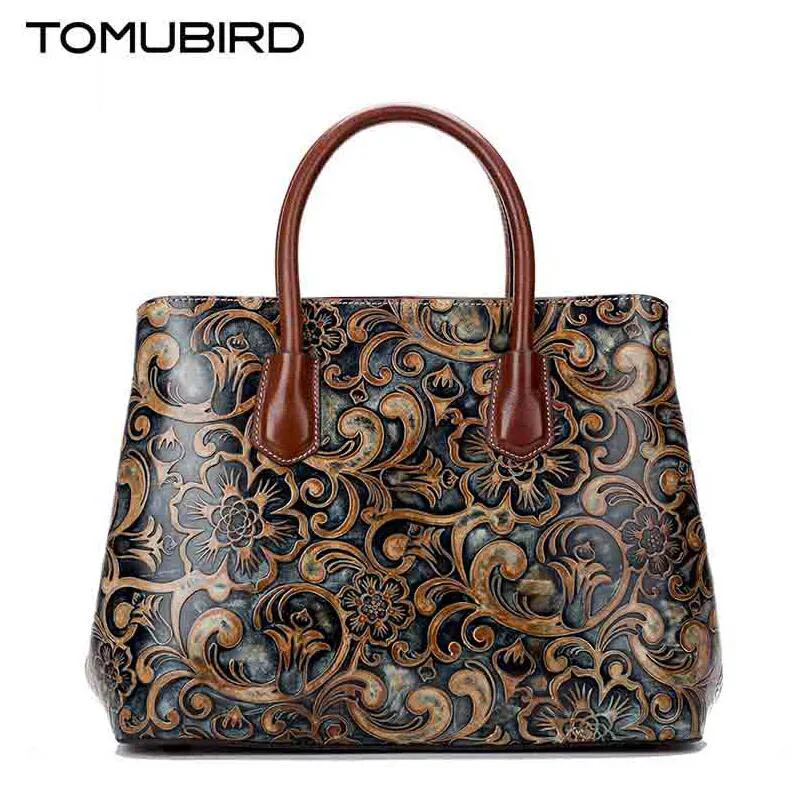 2017 New Genuine Leather China wind embossed shoulder Messenger bag female High-end air hand bag woman