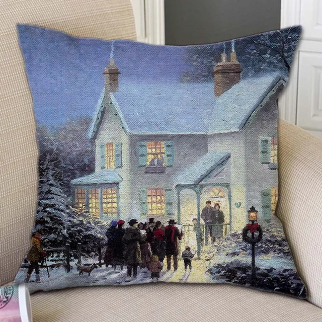 아늑함과 축제적인 분위기로 가득 찬 눈 덮인 집 크리스마스 장식 베개