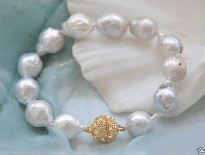 

Free Shipping >> Beautiful 10~12mm white baroque freshwater pearl bracelet 7.5 ~ 8 inches