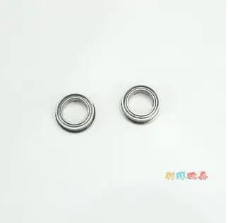Gros plan sur les roulements différentiels pour avion RC, mettant en avant leur finition lisse et leurs teintes multiples.