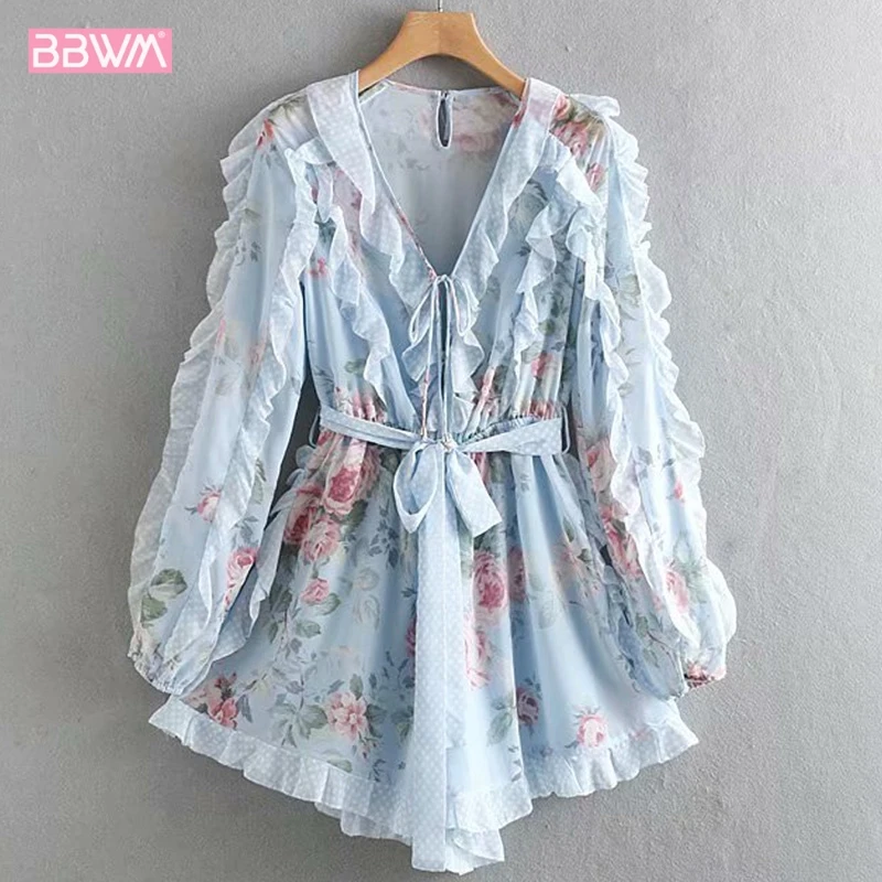 

2019 summer new women's beach holiday chiffon printing V-neck wave point lotus leaf wide leg jumpsuit women