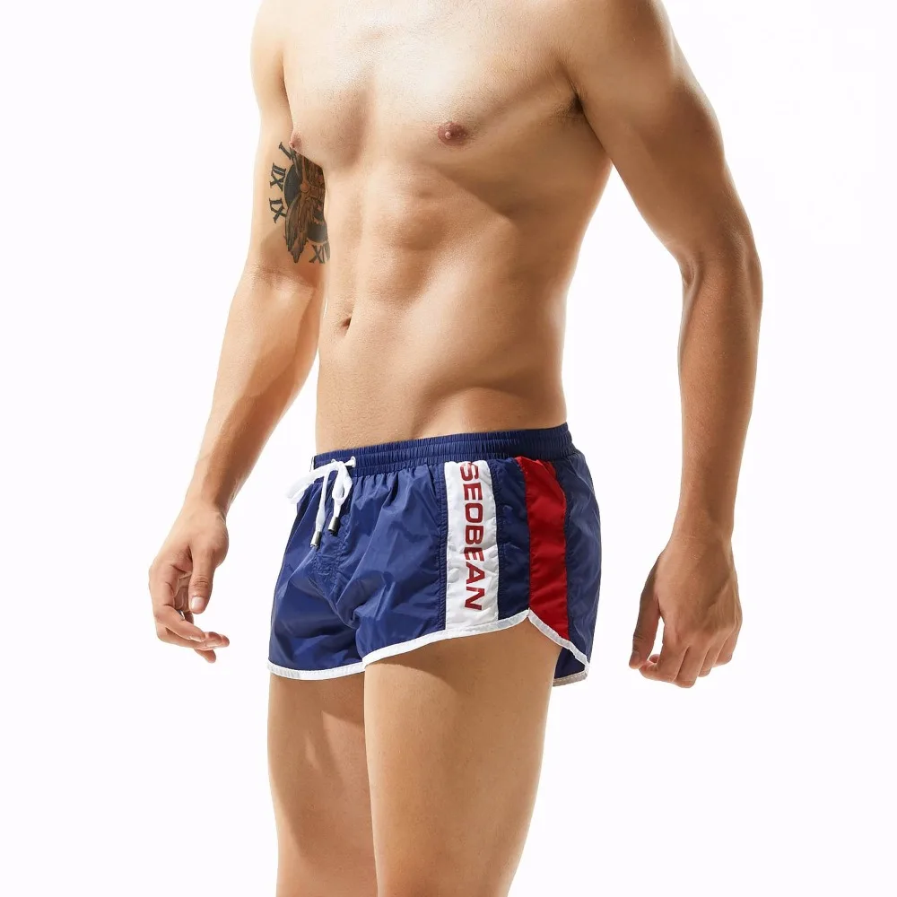 Новое поступление мужские шорты для бега супер короткие и мягкие дышащие быстросохнущие сексуальные спортивные фитнес пляжные шорты с подкладкой