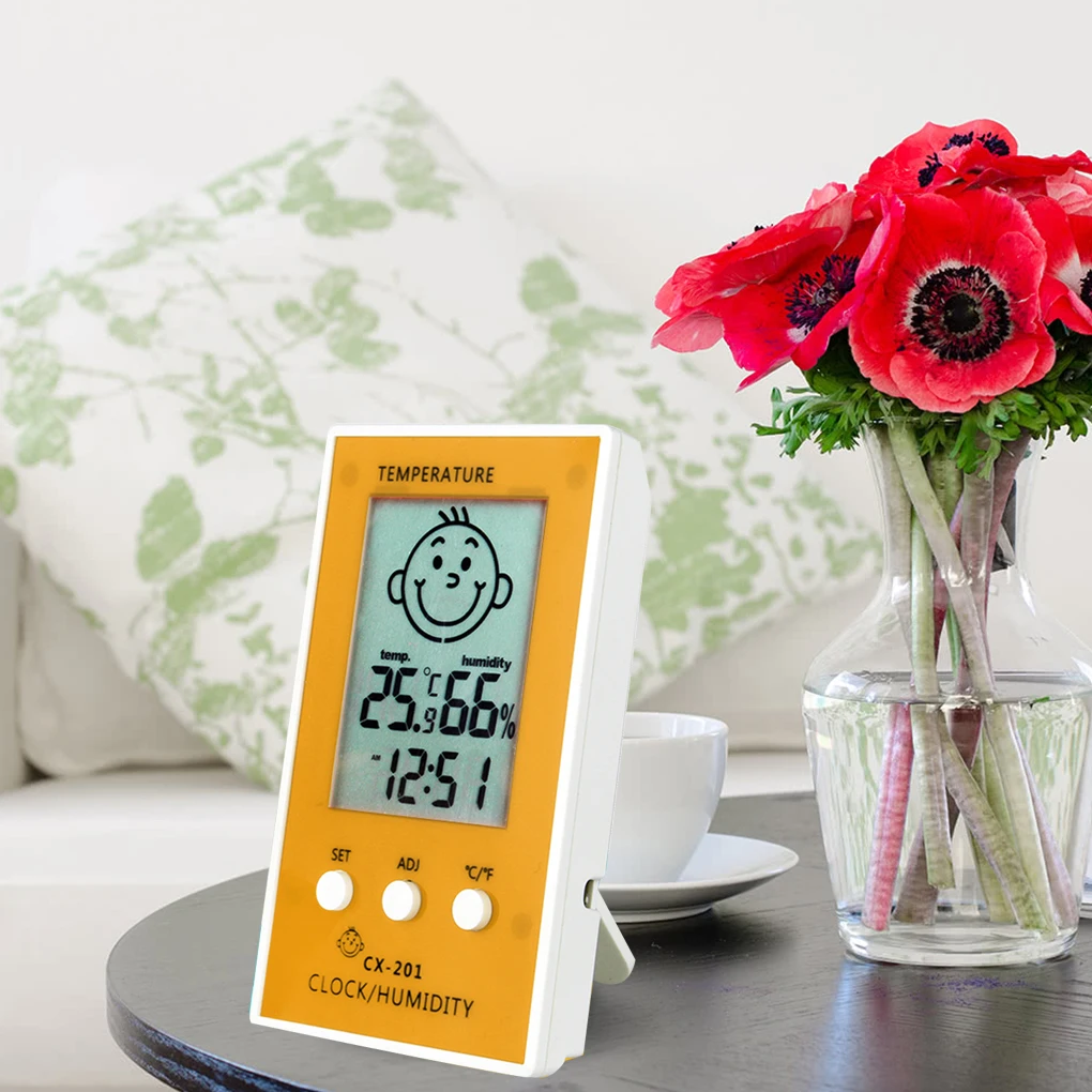 

CX-201 Digital LCD Thermometer Hygrometer Clock Humidity Temperature Meter Baby Face Comfort Level Display Weather Station