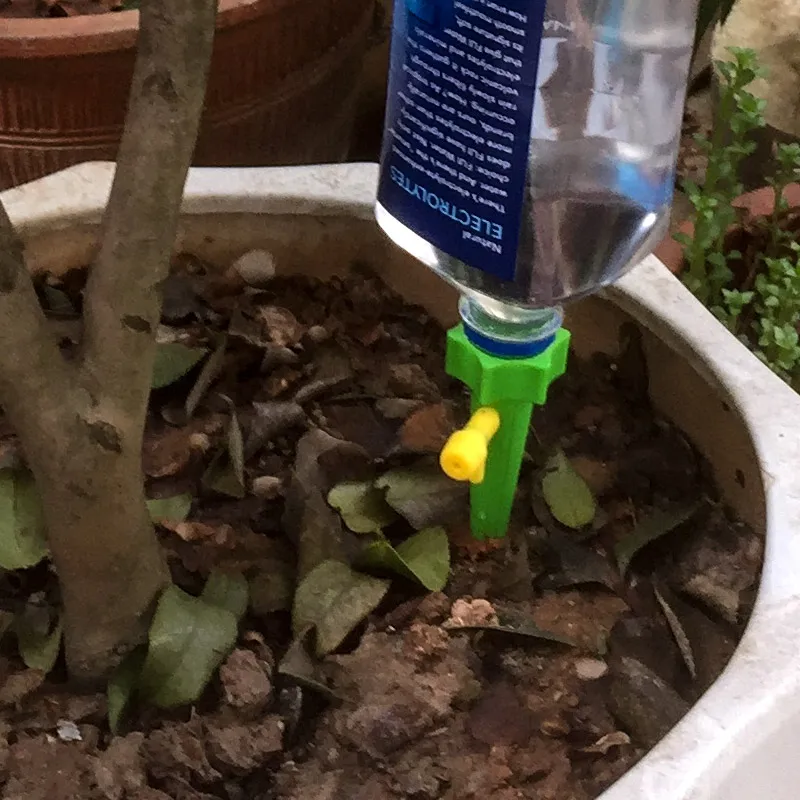 4//12Pcs Automatic Watering Irrigation Spikes Garden Plant Flower Bottle Dripp