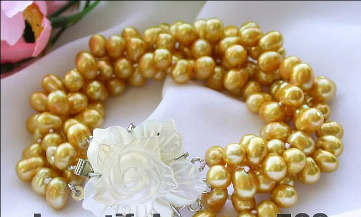 

z2945 4row 7mm yellow rice freshwater pearl bracelet ^^^@^Noble style Natural Fine jewe SHIPPING 5.25