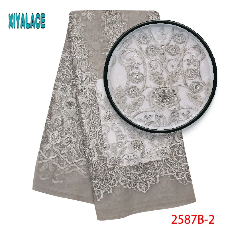 

Luxury Lace Fabric High Quality 2019 African Handbead Beads Lace Fabric Embroidery French Lace Fabric For Bridal Dress 2587b