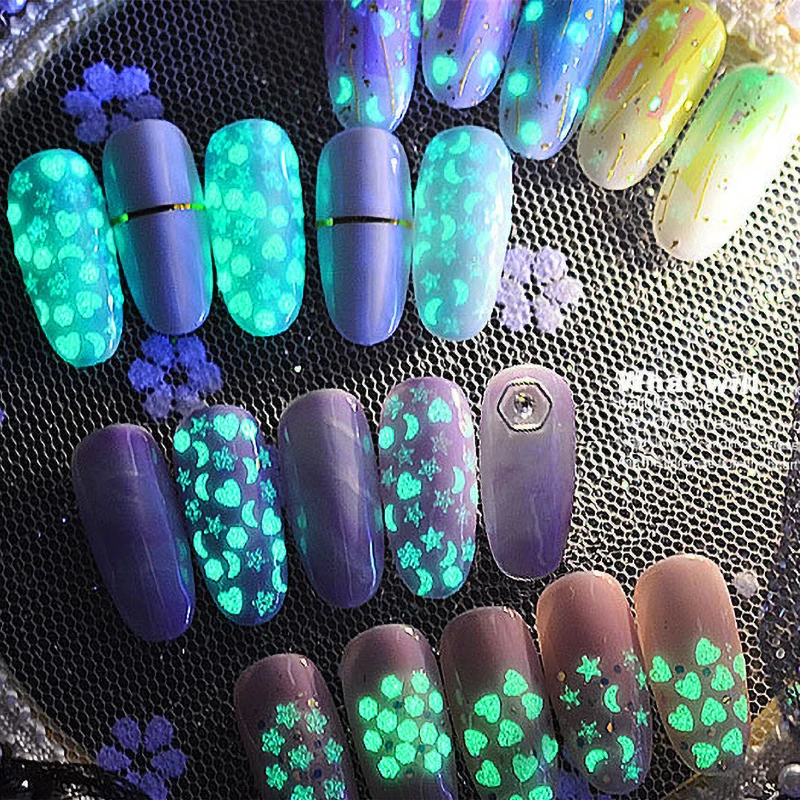 

1 Box Nail Art Sequins Fluorescent Luminous Heart Moon Flowers Pattern Ultra--thin Flakes Power Glow in the Dark Nail Tips Decor