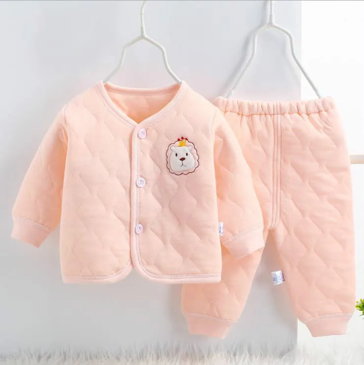 The newborn's thermal underwear set, with a cartoon top.