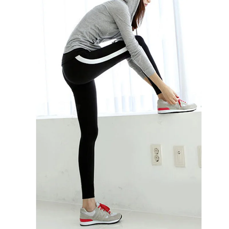 black leggings with white stripe down the side