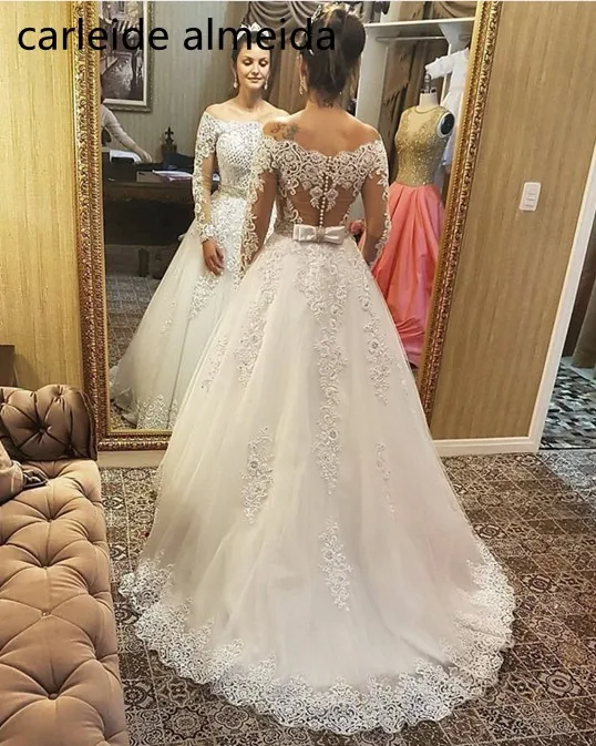 [تصویر:  Robe-de-mariee-2-in-1-Long-Sleeves-Weddi...-Dress.jpg]