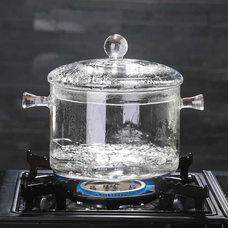

High borosilicate glass saucepan can be heated in an electric pottery oven with a glass pan covered in a glass bubble bowl
