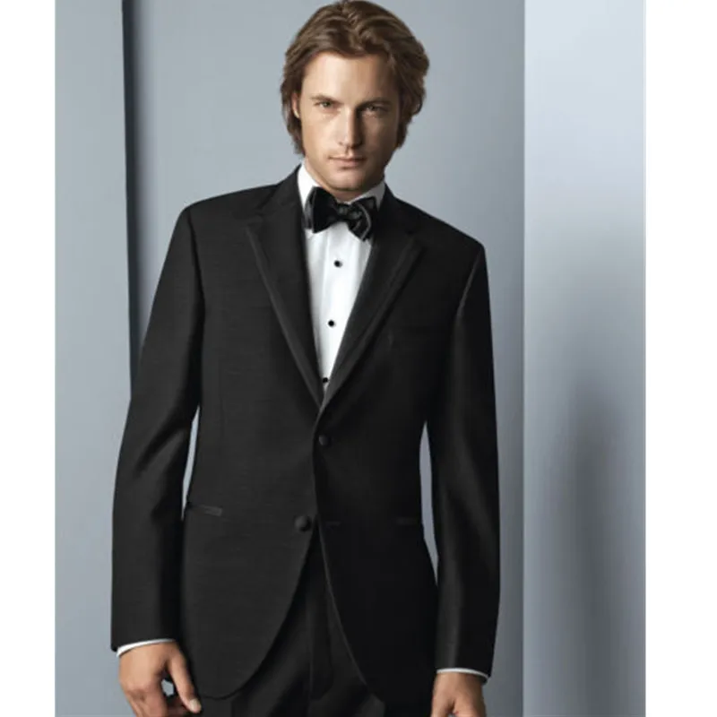 Мужчина в костюме. Мужской костюм на заказ. Мужской костюм темно-синий. Дорогие мужские костюмы. Человек в смокинге.