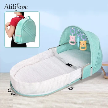 

Foldable Baby Bed Travel Bassinet Functions As A Diaper Bag And Changing Station Baby Bag Newborn Carrier Infant folding crib
