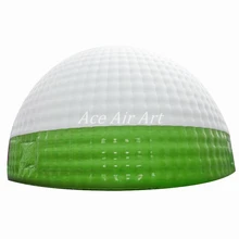 Гигантский надувной купол белого и зеленого цвета поставляется с воздуходувкой, изготовленной Ace air Art