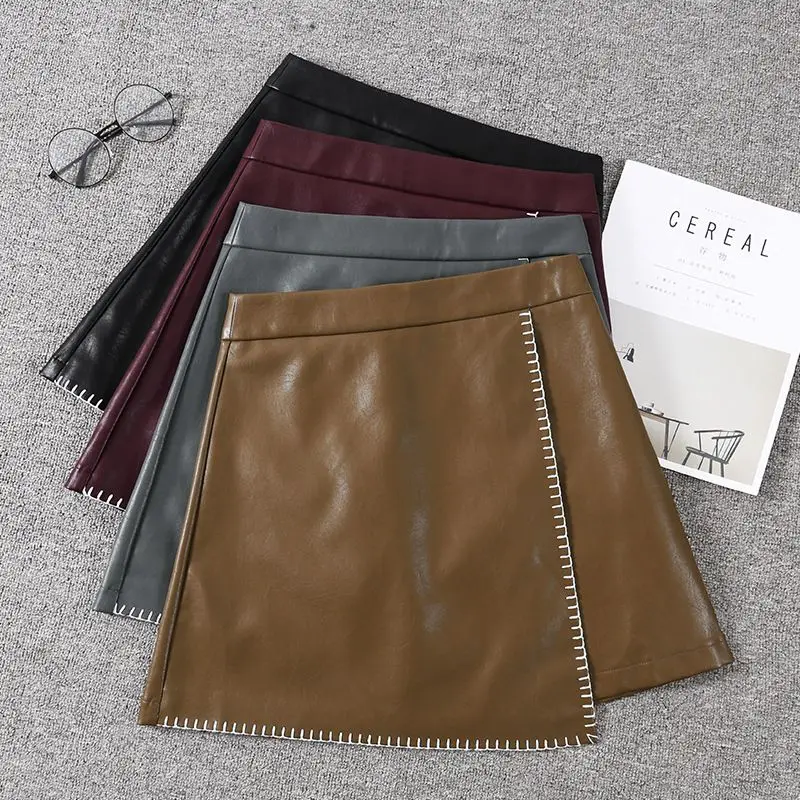 Женская модная юбка из искусственной кожи с высокой талией на молнии, черные мини юбки с асимметричным подолом, Saias S-4XL, 5XL, осень, SK227