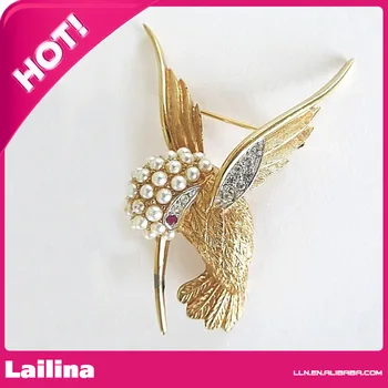 

Rare vintage Boucher Humming Bird pin brooch w pearls & red eye