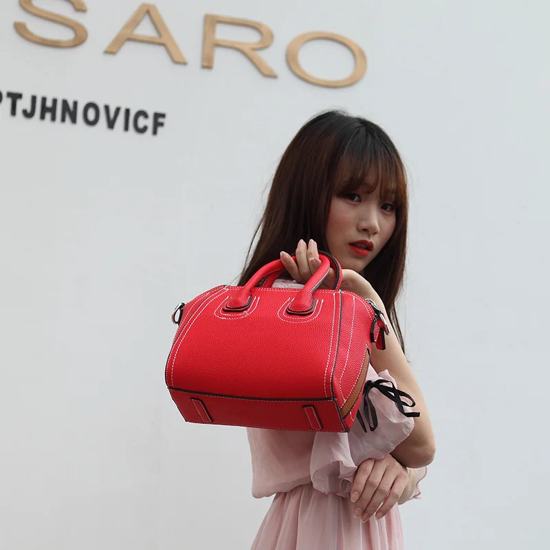 Simple solid color fashion brand Korean smiley face designer handbags high quality lychee soft face Genuine Leather women bag