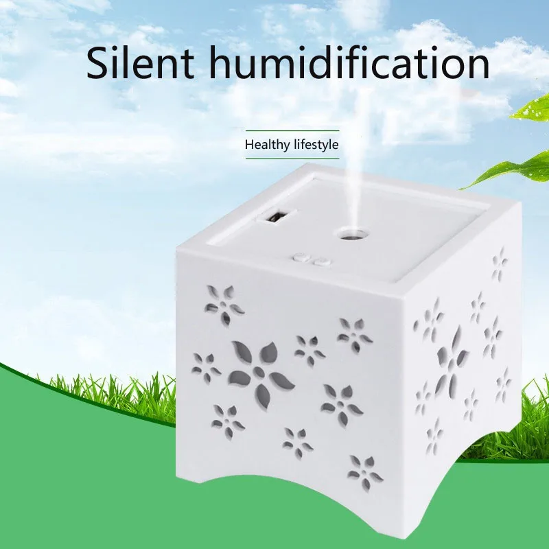 

Hollow mini USB fan humidifier Small aromatherapy machine Colorful night light Mute Air net atomizing hydrating humidifier