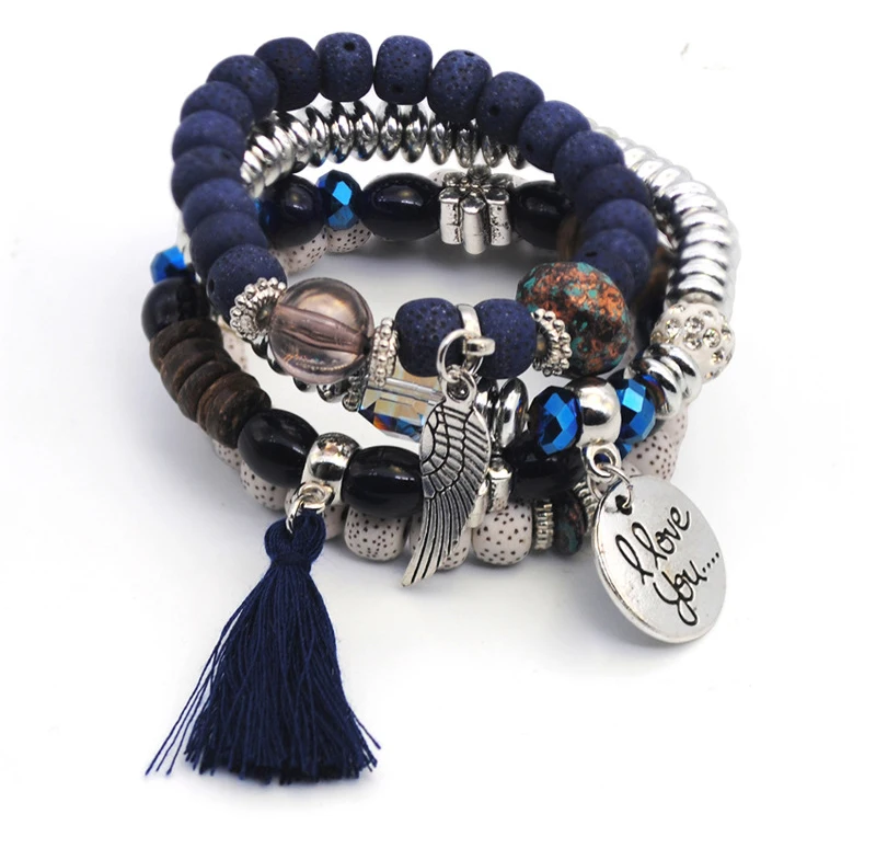 Linden-tree-wood-bracelet-with-tassel-angle-wing-charm_04