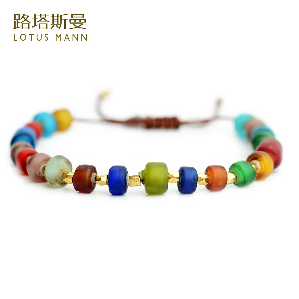 

Lotus mann Coloured glaze color white core and Kim adjustable lap bracelet