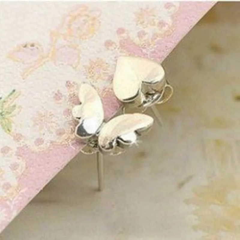 

Popular butterfly face beautiful peach heart earrings simple personality earrings asymmetric models