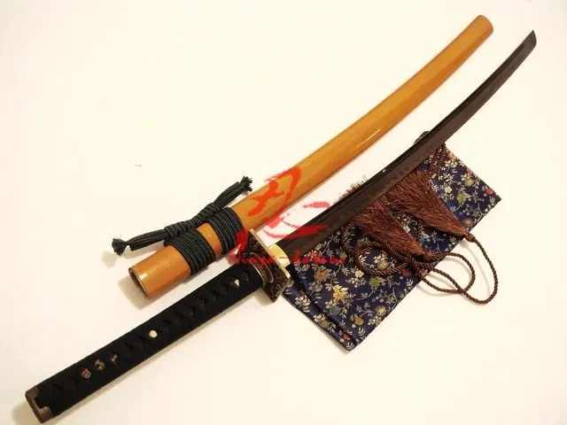 

clay tempered T-10 steel battle ready blade japan katana wave tsuba yellow sword sharpend