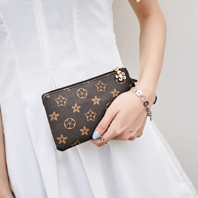 2018 New Well-known Brand Fashion Woman Cosmetic Bags PU Card Mobile Phone Money Travel Organizer Clutch Bag Casual Evening Bag