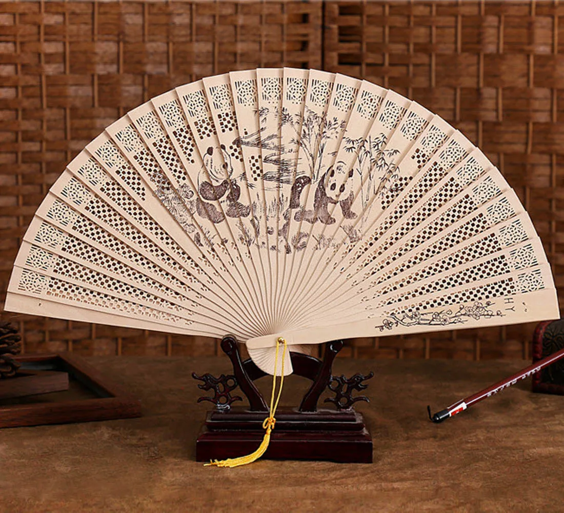 

Chinese Traditional Hollow Fan Wooden Hand Made Exquisite Folding Wedding Gift Hot Sale High Quality 2018 New Patterns
