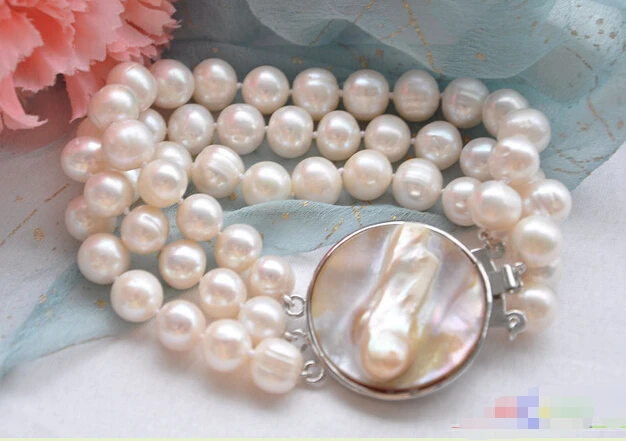 

Free shipping >>>>>>P4057 3row 8" 10mm WHITE ROUND FRESHWATER PEARL BRACELET