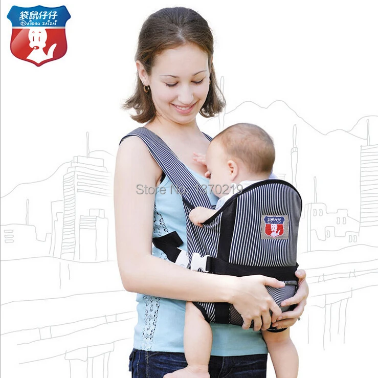 baby holding bag