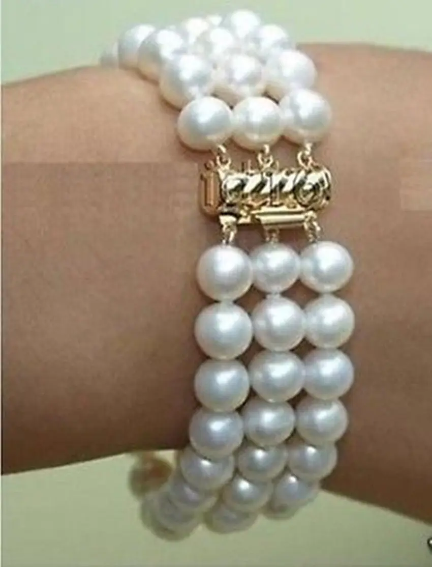 

Free shipping >>>>>>3row 7-8mm WHITE FRESHWATER PEARL BRACELET