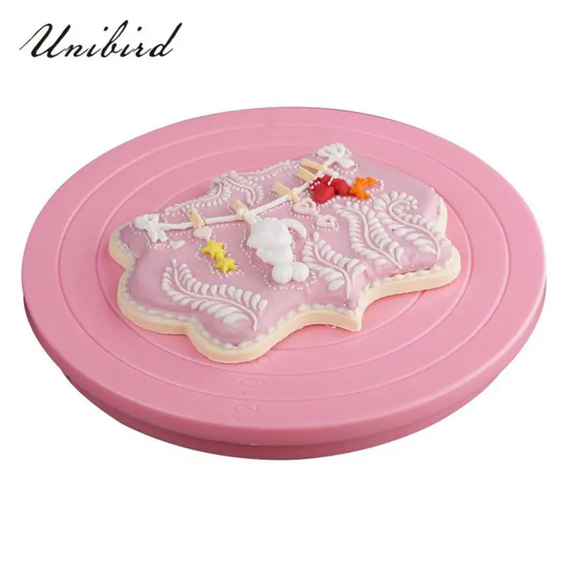 

Unibird Mini Plastic Cake Turntable Revolving Platform Round Cookie Stand Rotating Home DIY Cake Rotary Table Fondant Cake Decor