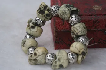 

Worthy collection of silver beads and skull series into rosary bracelet