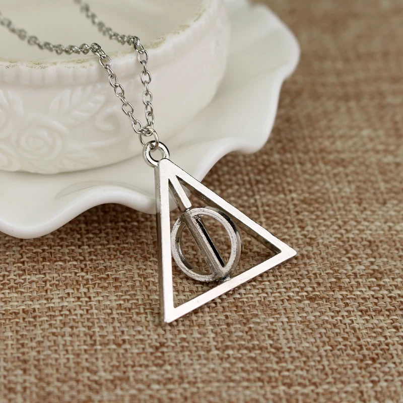 20 шт/партия популярный Киношный ожерелье Гарри Deathly Hallows модная вращающаяся подвеска треугольная цепочка ожерелье для женщин и мужчин ювелирные изделия