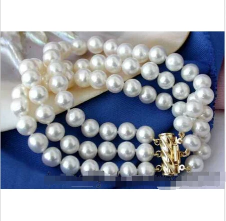 

Free shipping >>>>>>z2500 3row 9mm round white freshwater pearl bracelet