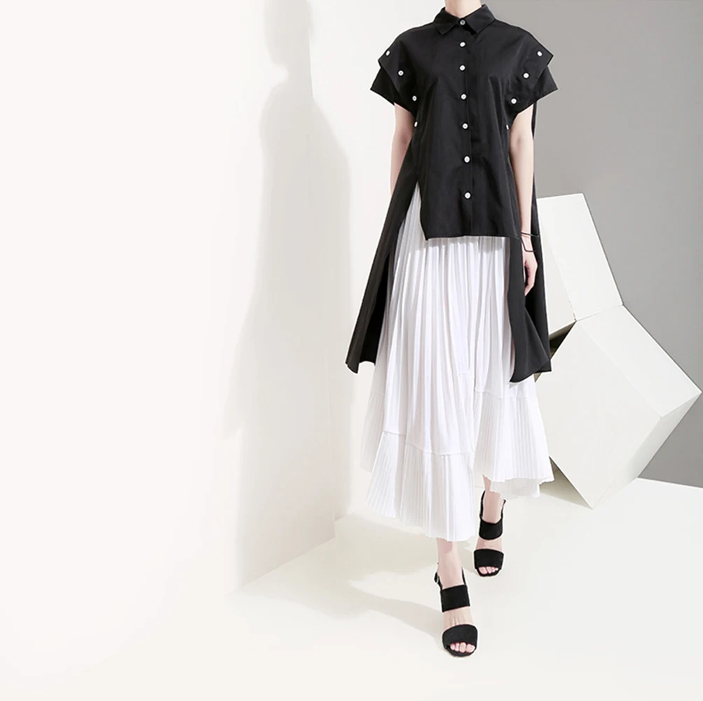 Spring and summer new style Women's sense of design Wild loose short-sleeved shirt Fashion temperament irregular top