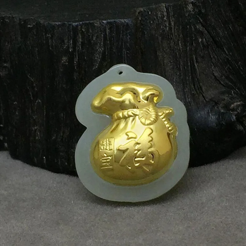 

Yu xin yuan Hetian jade Natural gold inlay Little bag pendant