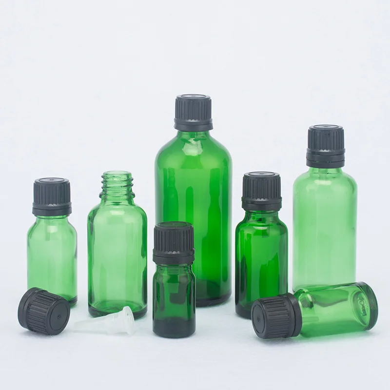 

10pcs/Lot 5ml/10ml/15ml/20ml/30ml/50ml/100ml Anti Theft Cover (Black / White Cap) Essential Oil Bottle Green Glass Oil Bottle