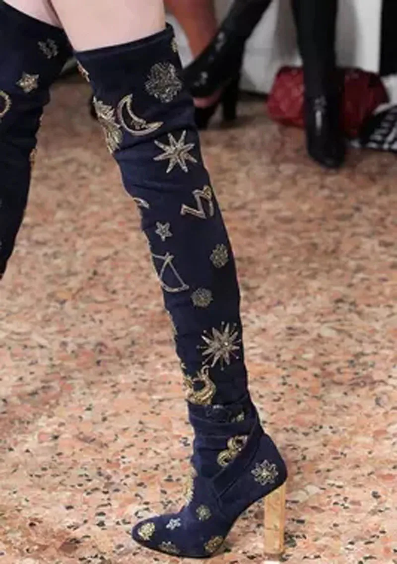 thigh high moon boots