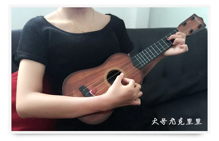 Музыкальная игрушка пластиковая укулеле для начинающих детей