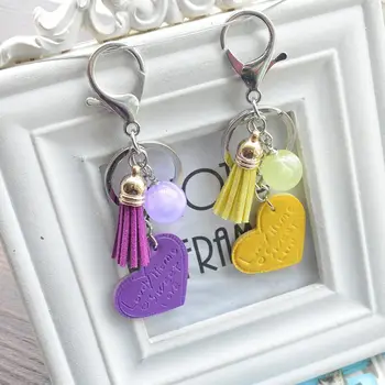

1pc peach heart-shaped lather keychain fashion cute bag hanging tassels decoration car phone accessory concise cute lovely gift