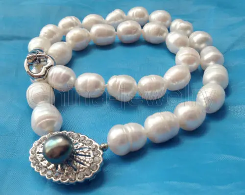 

Free shipping@@@@@ Beautiful 17" 14mm white rice shape freshwater pearl necklace - GP clasp a