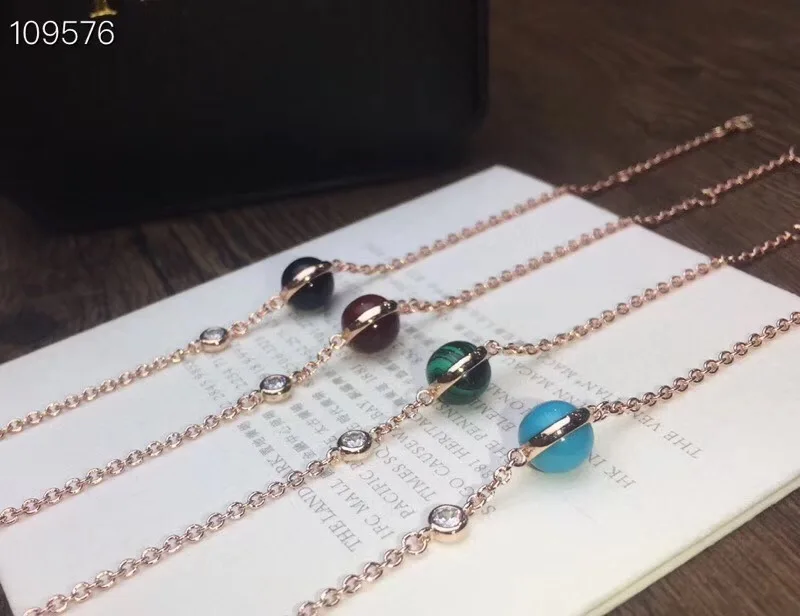 

Fashion designer famous brand party jewelry bead ball rotate bracelet 4 colors gem stone ball rotating bracelet turn women gift