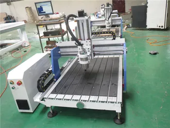 

Ecnomic Wood CNC router with rotary 1.5kw water spindle and DSP